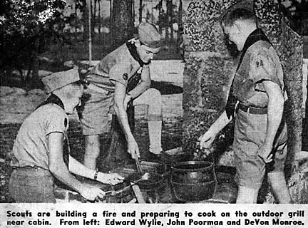 Cooking on outdoor grill at cabin (Edward Wylie (left) earned Eagle in 1949)