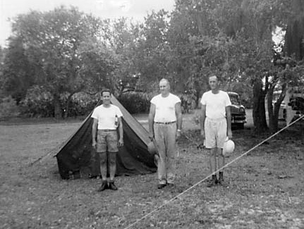At attention in front of a tent
