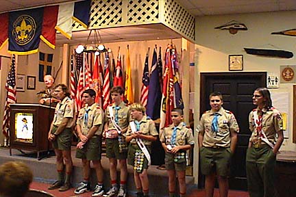 Presentation of merit badge cards at Court of Honor